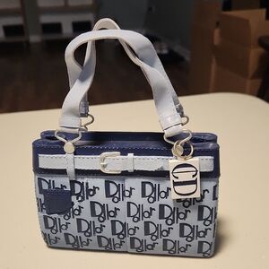 Fun, stylish, designer bag-shaped piggy bank